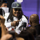 Seattle Seahawks running back Marshawn Lynch greets reporter at Super Bowl Media Day on Tuesday. (Photo: Seattle Seahawks)